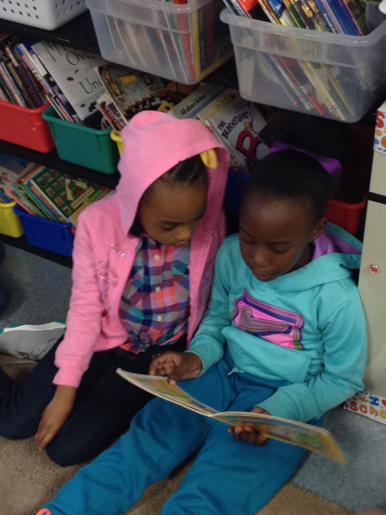 Two more super-focused Roadrunners--Sara and Makayla--read together.